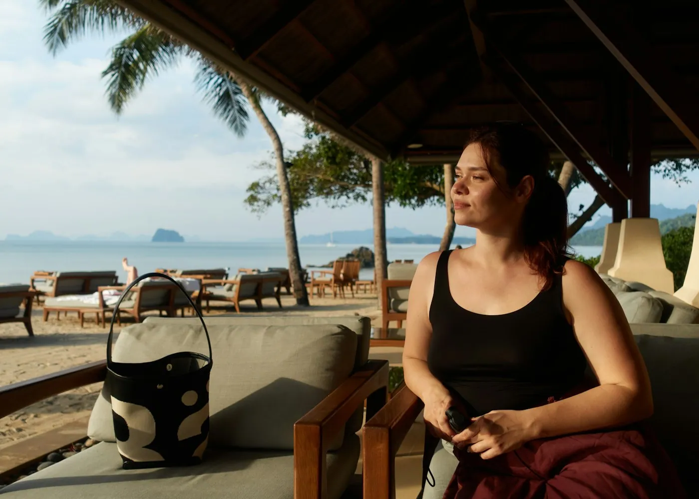 A relaxed traveler enjoying a sunny resort