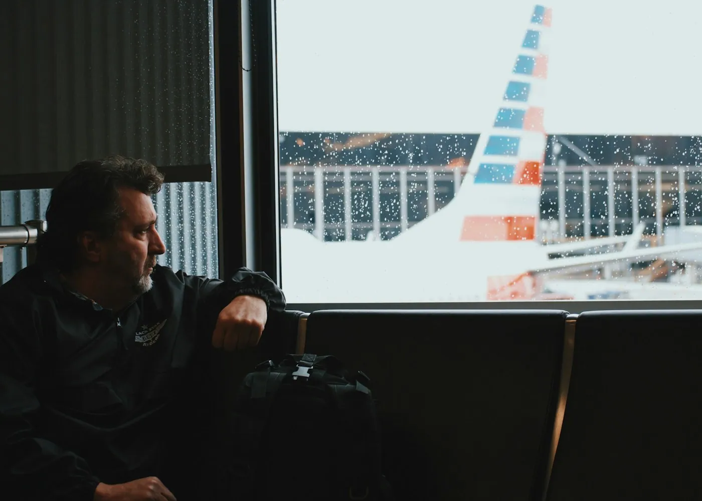 A lone traveler waiting at the airport