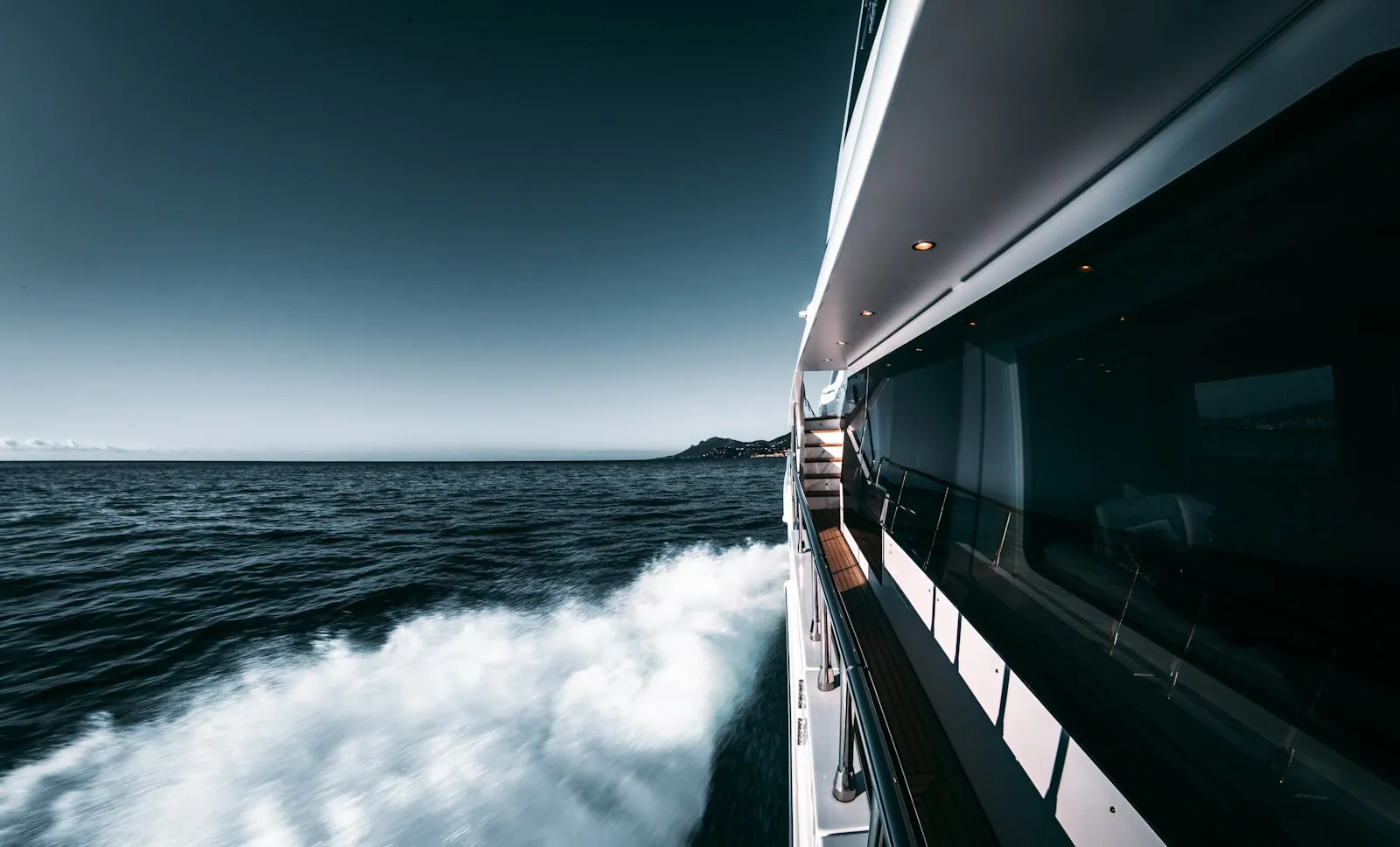 A private yacht cruising open blue water